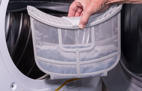 senior-man-cleaning-the-lint senior-man-cleaning-the-lint
